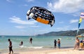 Phuket, Thailand: Paragliding at Patong Beach Royalty Free Stock Photo