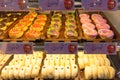 Trays of freshly made donuts