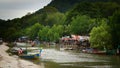 2019-11-05 / Phuket, Thailand - Wooden shacks by the river in a poverty stricken area of the town