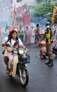 Phuket Town / Thailand - October 7, 2019: Phuket Vegetarian Festival or Nine Emperor Gods Festival parade with woman and child on