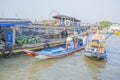 Phung Hiep floating market at seven-ways crossroads (Nga Bay), Can Tho city, Tien Giang Royalty Free Stock Photo