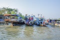 Phung Hiep floating market at seven-ways crossroads (Nga Bay), Can Tho city, Tien Giang Royalty Free Stock Photo