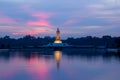 Sunset sky and Buddha statue at PhutthamonthonBuddhist park in Nakhon Pathom Province of Thailand