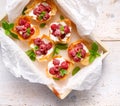 Phyllo cups with Mascarpone cheese filling topped with raspberries, top view