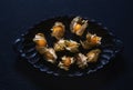Physalis in a cast-iron plate Royalty Free Stock Photo