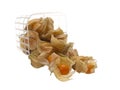 Physalis falling from the container Royalty Free Stock Photo