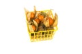 Physalis fruits in plastic basket on white Royalty Free Stock Photo