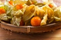 Physalis on a wooden table Royalty Free Stock Photo