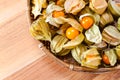 Physalis on a wooden table Royalty Free Stock Photo