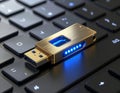Golden YubiKey-Style Hardware Security Token with Blue LED Glow Royalty Free Stock Photo