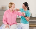 Physical therapist checking womans shoulder Royalty Free Stock Photo