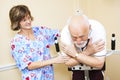 Physical Therapist Works with Senior Royalty Free Stock Photo