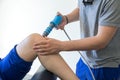 Physical therapy of the knee and the foot with shock wave Royalty Free Stock Photo