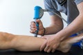 Physical therapy of the knee and the foot with shock wave Royalty Free Stock Photo