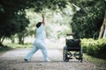 Physical therapy senior woman with wheelchair Royalty Free Stock Photo