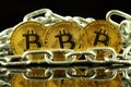 Physical version of Bitcoin new virtual money and chain. Conceptual image for investors in cryptocurrency and Blockchain Technol Royalty Free Stock Photo