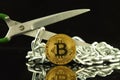 Physical version of Bitcoin, scissors and chain. Conceptual image for Blockchain Technology and hard fork term refers to a situat Royalty Free Stock Photo