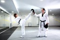 Physically challenged girl in martial arts training taekwondo Royalty Free Stock Photo