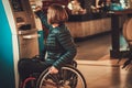 Physically challenged woman near ATM Royalty Free Stock Photo