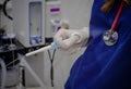 Physician assistant holding biopsy clamp during endoscopy. A patient with complaints of pain in the stomach undergoes an Royalty Free Stock Photo