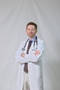 Physician with Crossed Arms, white coat, and stethoscope