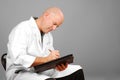 Physician Making Notes