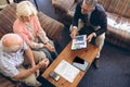 Physician showing medical statistics to senior couple Royalty Free Stock Photo