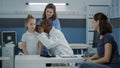 Physician using otoscope on small child to do ear examination