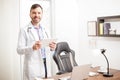 Physician using a tablet in his office Royalty Free Stock Photo