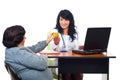 Physician woman offering apple to elderly