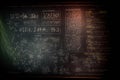 Physics calculations and scientific formulas written on a blackboard Royalty Free Stock Photo