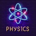 Physics lesson glowing banner. Atom with neon sign Royalty Free Stock Photo