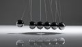 Physics in Motion - A Newtons Cradle Royalty Free Stock Photo