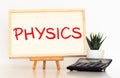 PHYSICS word written on wood block Royalty Free Stock Photo