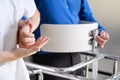 Physiotherapist assisting a patient with Amyotrophic Lateral Sclerosis. Royalty Free Stock Photo