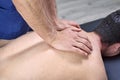 Physiotherapist doing a mobilization neck of female patient. Manual therapy. Neurological physical examination. Osteopathy, Royalty Free Stock Photo