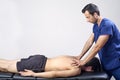 Physiotherapist doing a mobilization neck of female patient. Manual therapy. Neurological physical examination. Osteopathy, Royalty Free Stock Photo