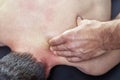 Physiotherapist giving a back massage. Chiropractic, osteopathy, manual therapy, acupressure Royalty Free Stock Photo