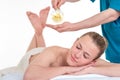 Physiotherapist giving back massage to a woman Royalty Free Stock Photo