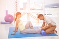 Physiotherapist giving physiotherapy to pregnant woman Royalty Free Stock Photo