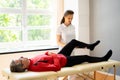 Physiotherapist Knee Treatment And Physical Therapy Royalty Free Stock Photo