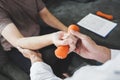 Physiotherapist man giving exercise with dumbbell treatment About Arm and Shoulder of athlete male patient Physical therapy Visit Royalty Free Stock Photo