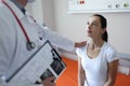 Physiotherapist provides physiotherapy assistance to recovering patient Royalty Free Stock Photo