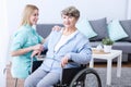 Physiotherapist rehabilitating senior woman