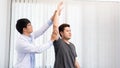 Physiotherapist working concept, Doctor and patient suffering or Chiropractor examining from shoulder or elbow pain in clinic Royalty Free Stock Photo