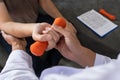 Physiotherapist working with patient doing with exercise, physical therapy concept Royalty Free Stock Photo