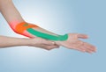 Physiotherapy for elbow pain, aches and tension. Royalty Free Stock Photo