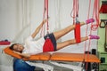 Physiotherapy: Exercise under supervision of physiotherapist. Treatment of pain in the spine with Red Cord equipment