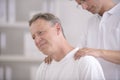 Physiotherapy: Physiotherapist massaging patient