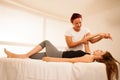 Physiotherapy -therapist exercising with patient , working on ar Royalty Free Stock Photo